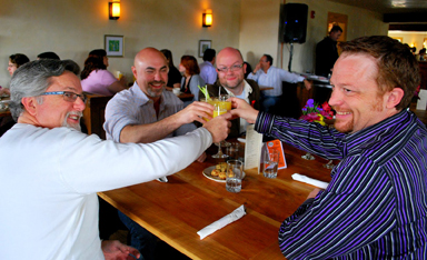 Tim Lawton, Rob Conlon, Todd Michael Thomas, and Michael Hall raise a toast to ARCS.