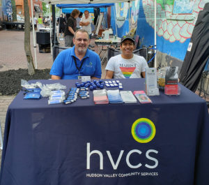 HVCS' Bob and Jovanny table at the O+ Festival in Poughkeepsie