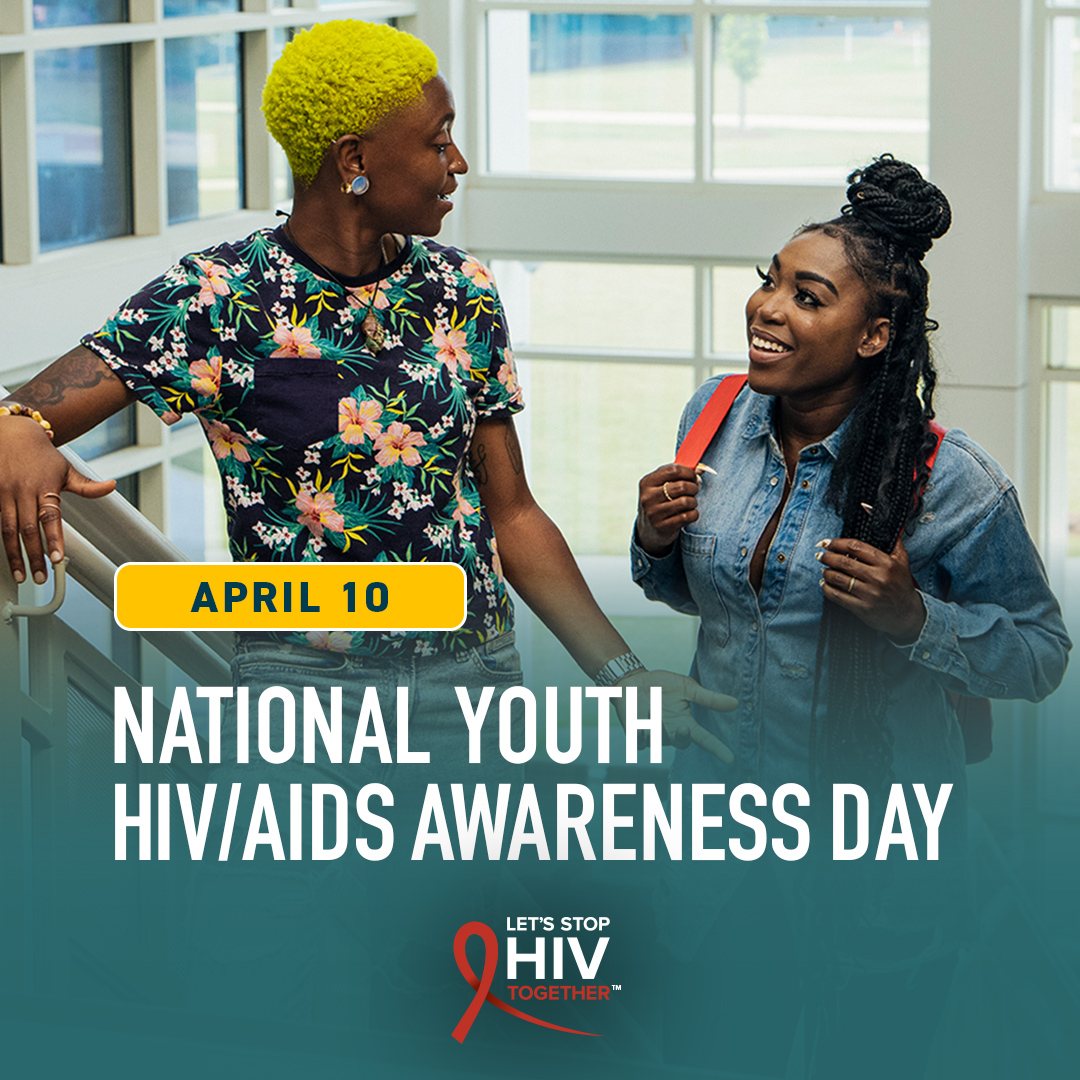 National Youth HIV/AIDS Awareness Day - two youth in modern clothing laugh together.